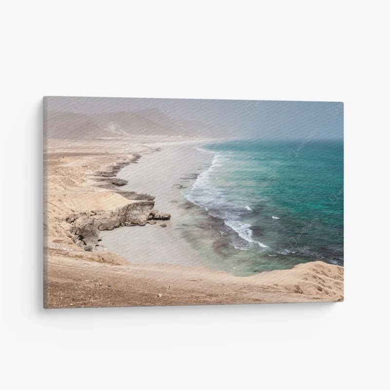 Quadro su tela orizzonte turchese: costa deserta e scogliere