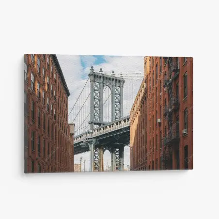 Quadro su tela vista del ponte di Manhattan tra edifici in mattoni • Wallissimo®