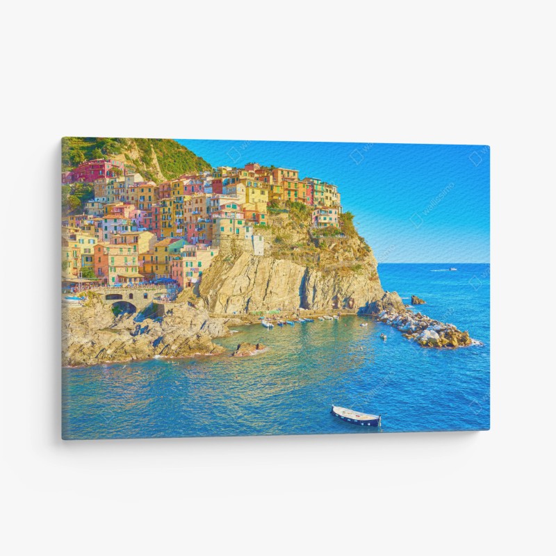 Quadro su tela borgo colorato sulla scogliera