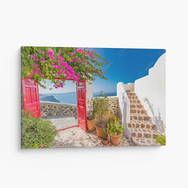 Quadro su tela cortile fiorito con vista Santorini
