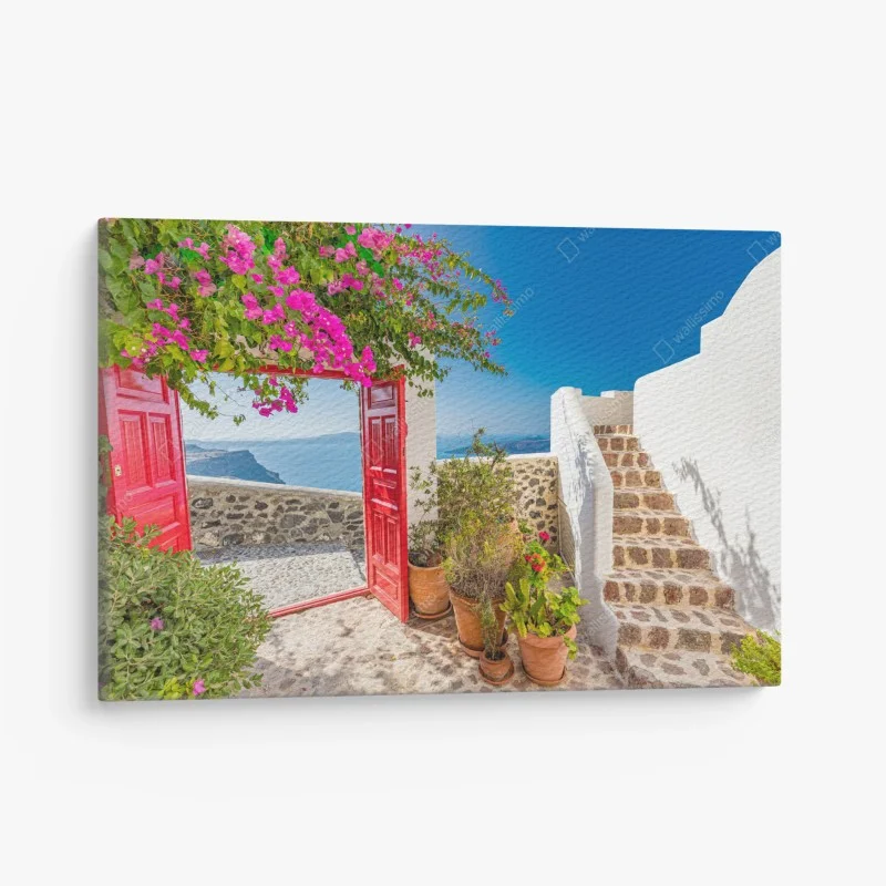 Quadro su tela cortile fiorito con vista Santorini