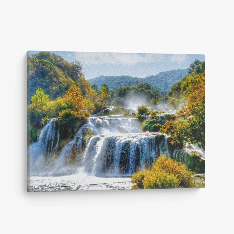 Quadro su tela cascata dorata nella foresta autunnale