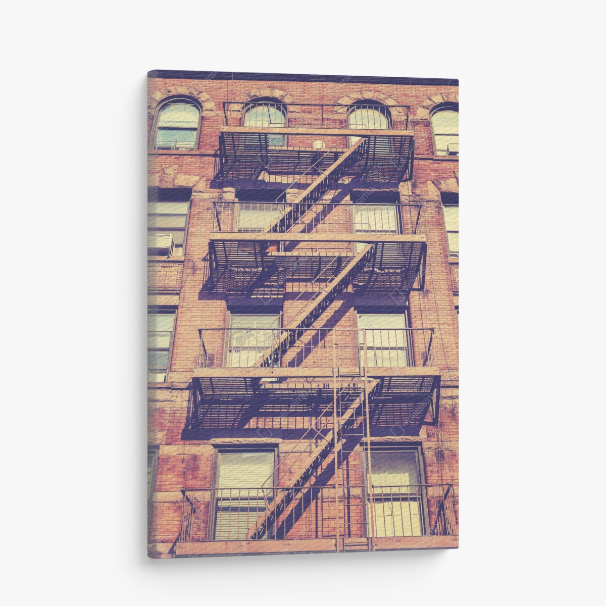 Quadro su tela facciata di New York con scale antincendio vintage • Wallissimo®