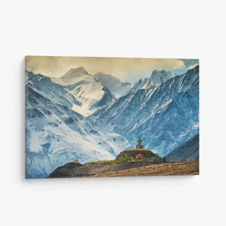 Quadro su tela statua buddista sulle montagne innevate dell'Himalaya • Wallissimo®