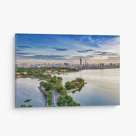 Quadro su tela tramonto sul lago con skyline cittadino • Wallissimo®