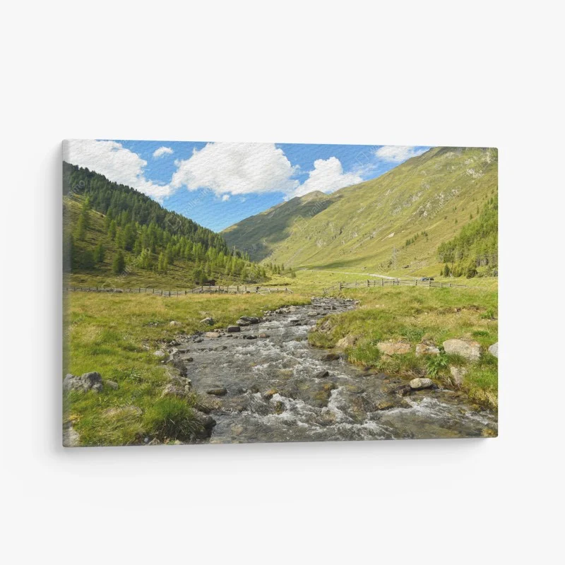 Quadro su tela panorama alpino con torrente e prati