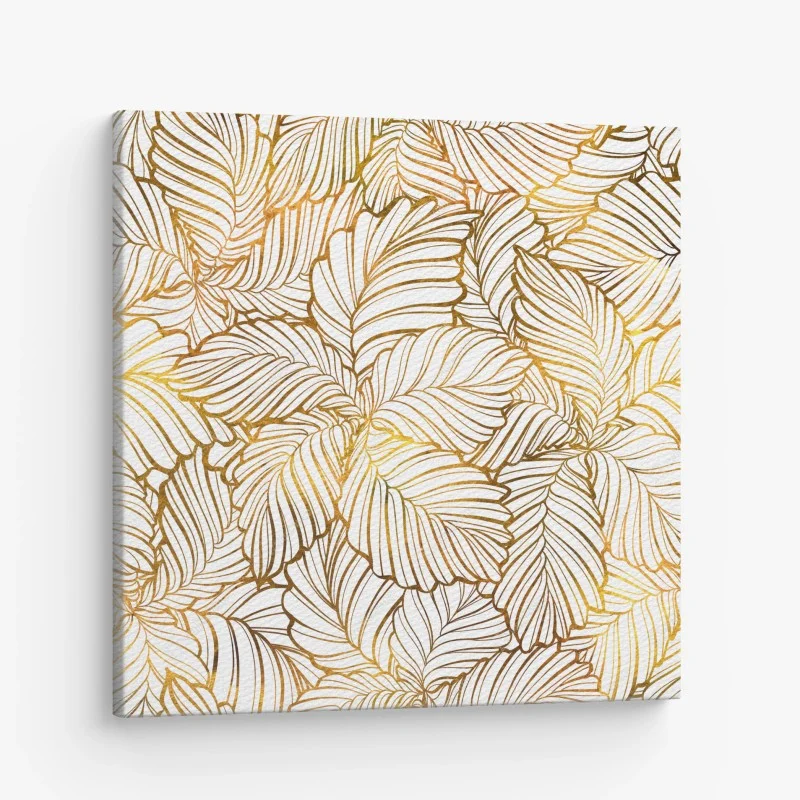 Quadro su tela motivo di foglie dorate su sfondo bianco