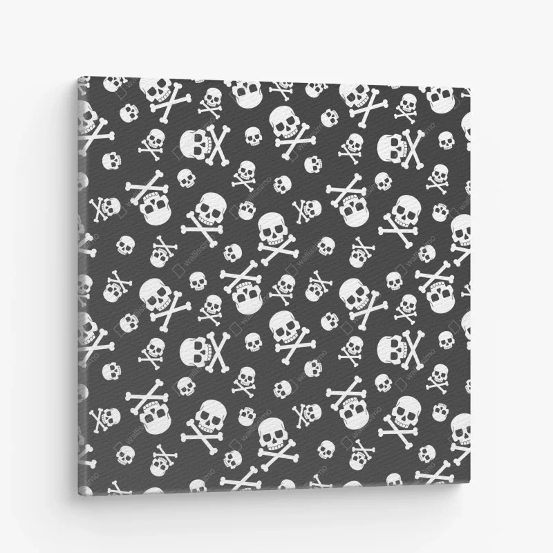 Quadro su tela motivo teschi e ossa incrociate su sfondo scuro