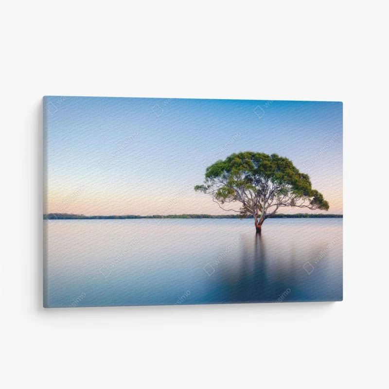 Quadro su tela albero solitario sul lago al tramonto