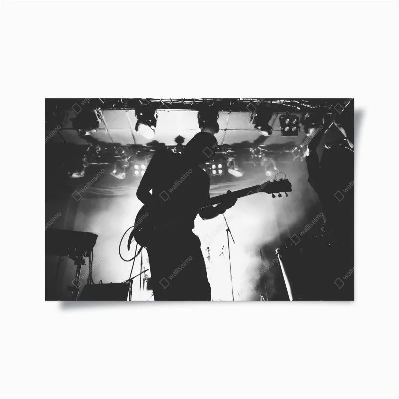 Poster silhouette di chitarrista in concerto