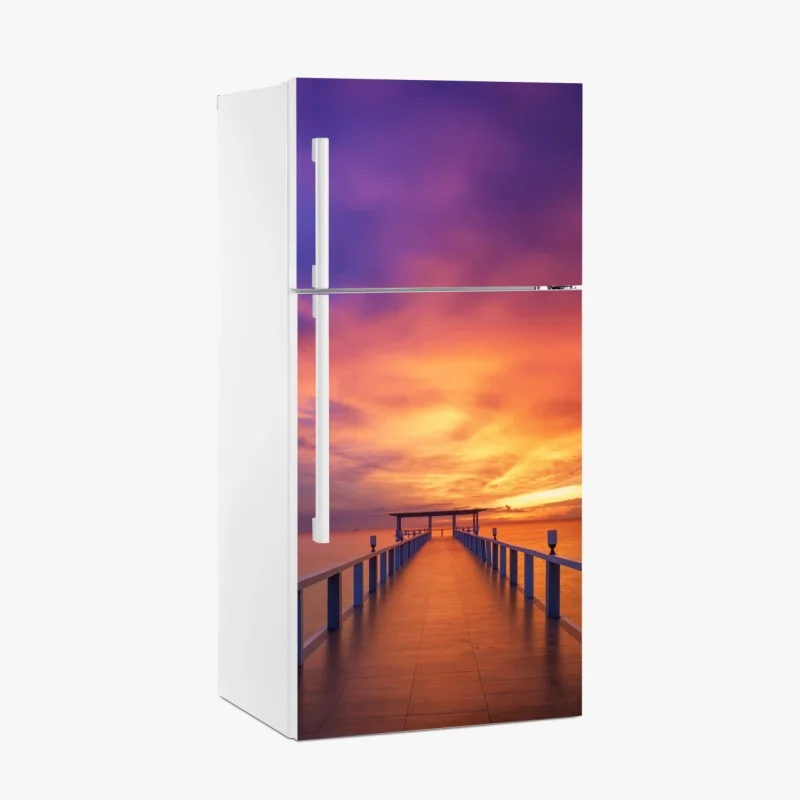 Adesivo per frigorifero pontile al tramonto dai colori intensi