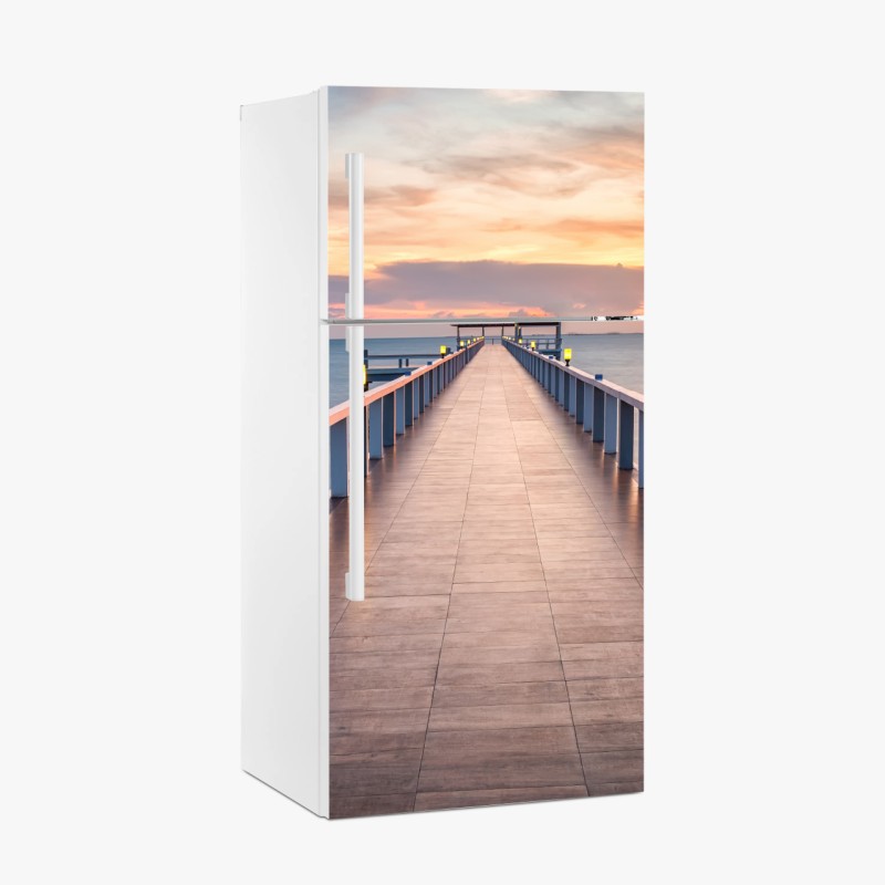 Adesivo per frigorifero passerella sul mare al tramonto
