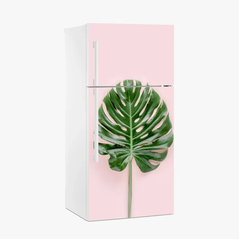 Adesivo per frigorifero foglia di monstera su sfondo rosa pastello