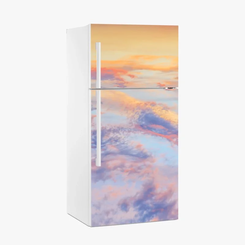 Adesivo per frigorifero cielo pastello all'alba dorata