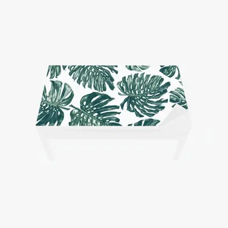 Adesivo per tavolo e scrivania design botanico con foglie di monstera su sfondo bianco • Wallissimo®