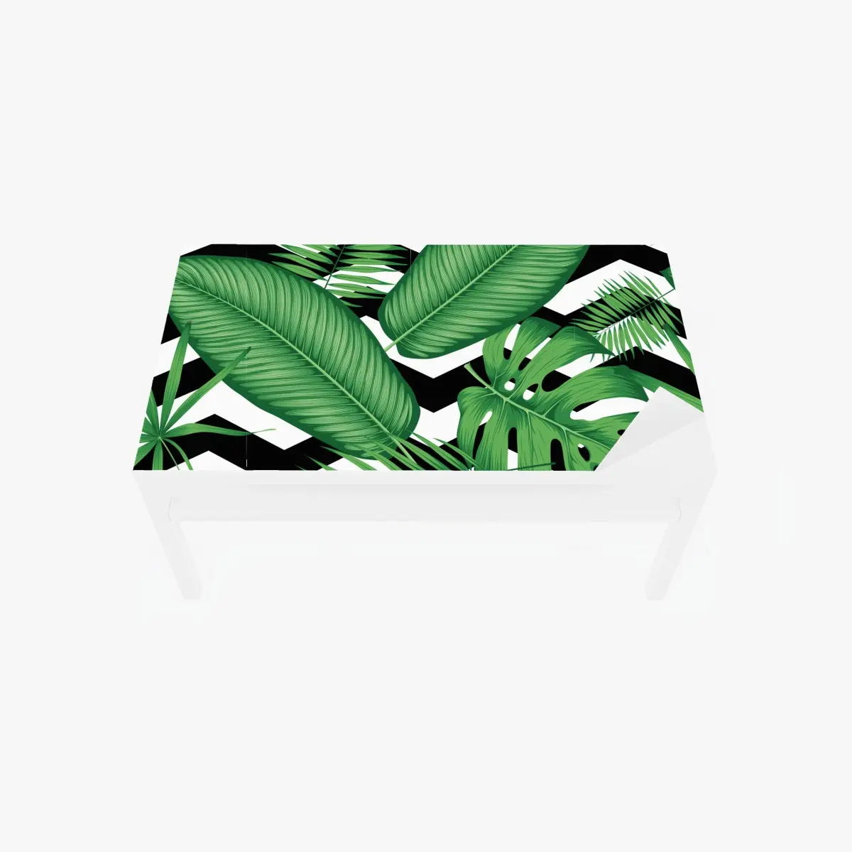 Adesivo per tavolo e scrivania grafica tropicale con foglie verdi su motivo zigzag • Wallissimo®