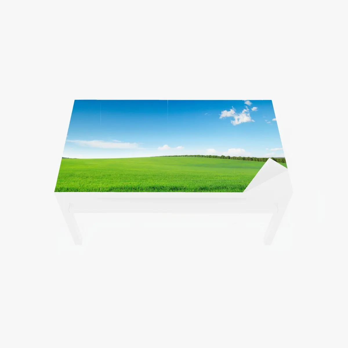 Adesivo per tavolo e scrivania prato verde sotto un cielo azzurro • Wallissimo®