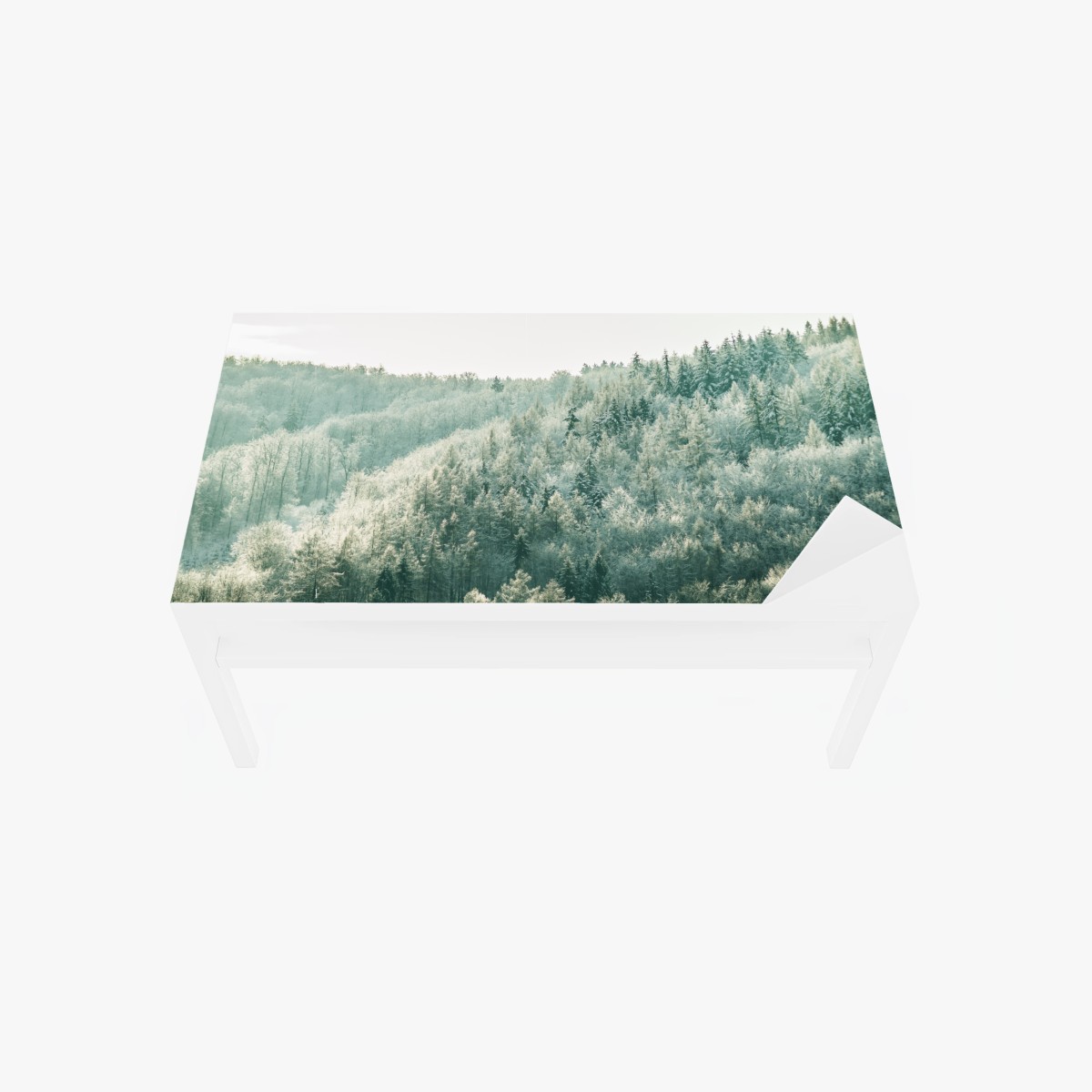 Adesivo per tavolo e scrivania silenzio luminoso della foresta innevata • Wallissimo®