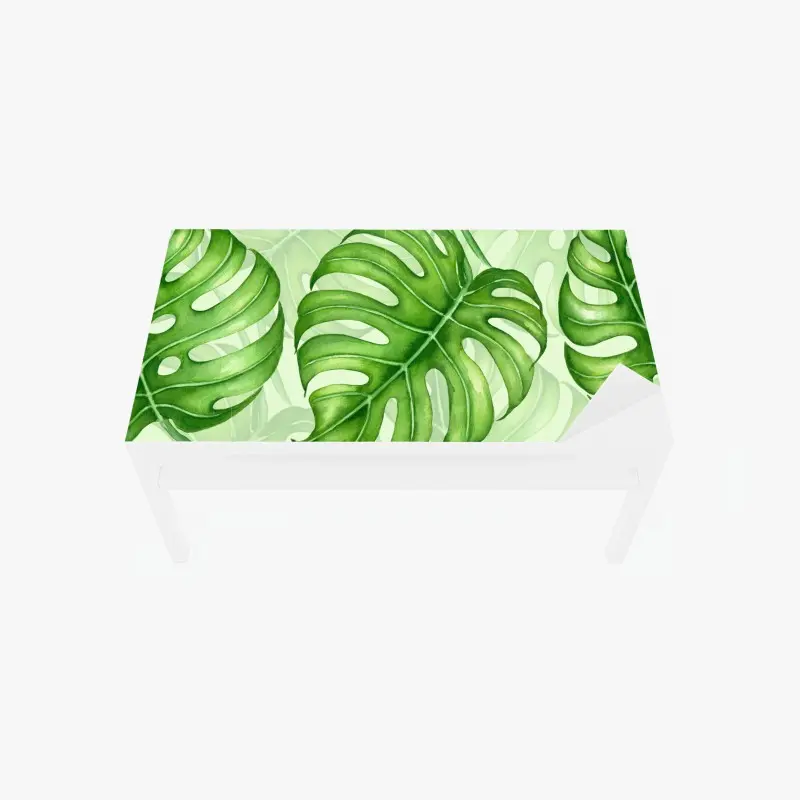 Adesivo per tavolo e scrivania motivo botanico di foglie di monstera in acquerello • Wallissimo®