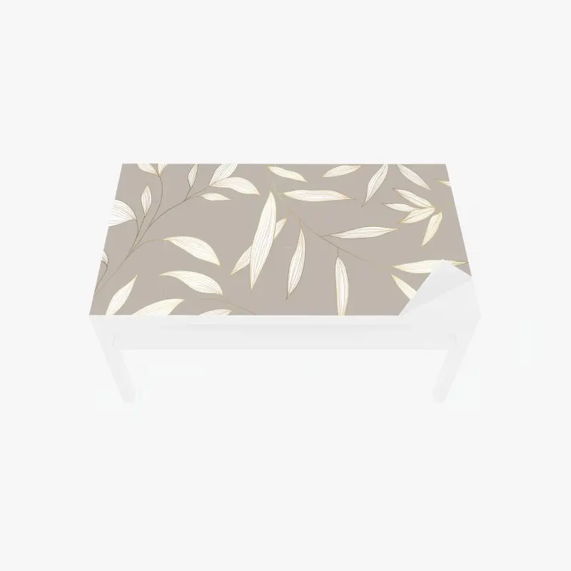 Adesivo per tavolo e scrivania motivo foglie dorate su sfondo beige