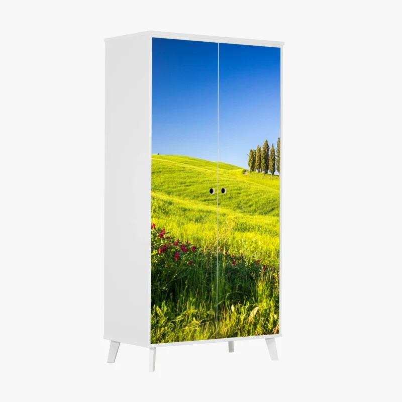 Adesivo per armadio colline verdi con filare di cipressi