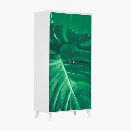 Adesivo per armadio elegante foglia di monstera su sfondo verde • Wallissimo®