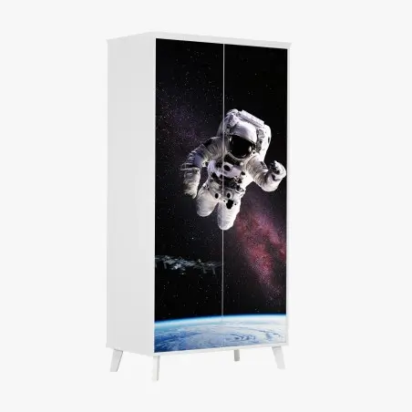Adesivo per armadio astronauta in orbita sopra la terra • Wallissimo®
