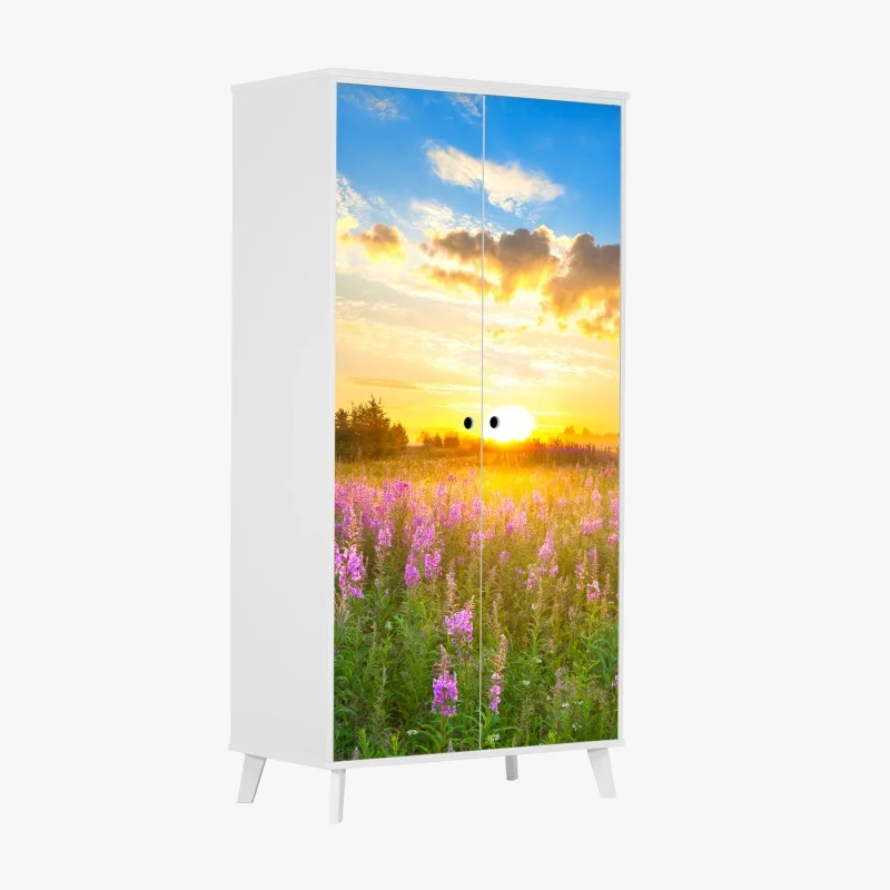 Adesivo per armadio alba dorata sul prato fiorito