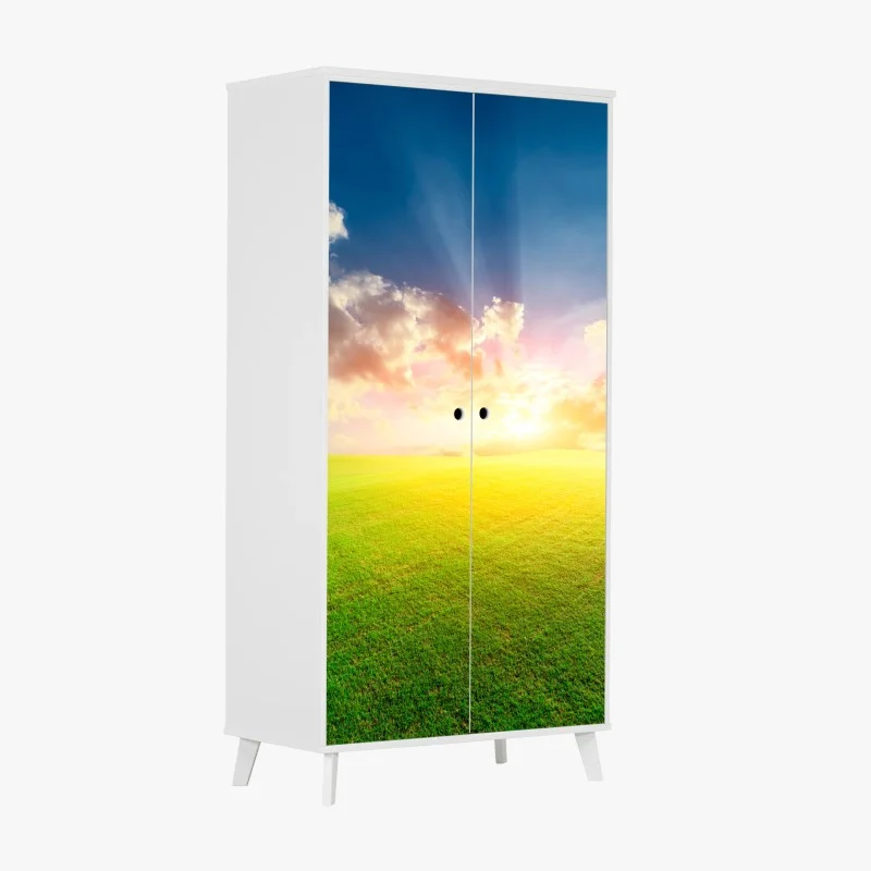 Adesivo per armadio tramonto dorato sul prato infinito