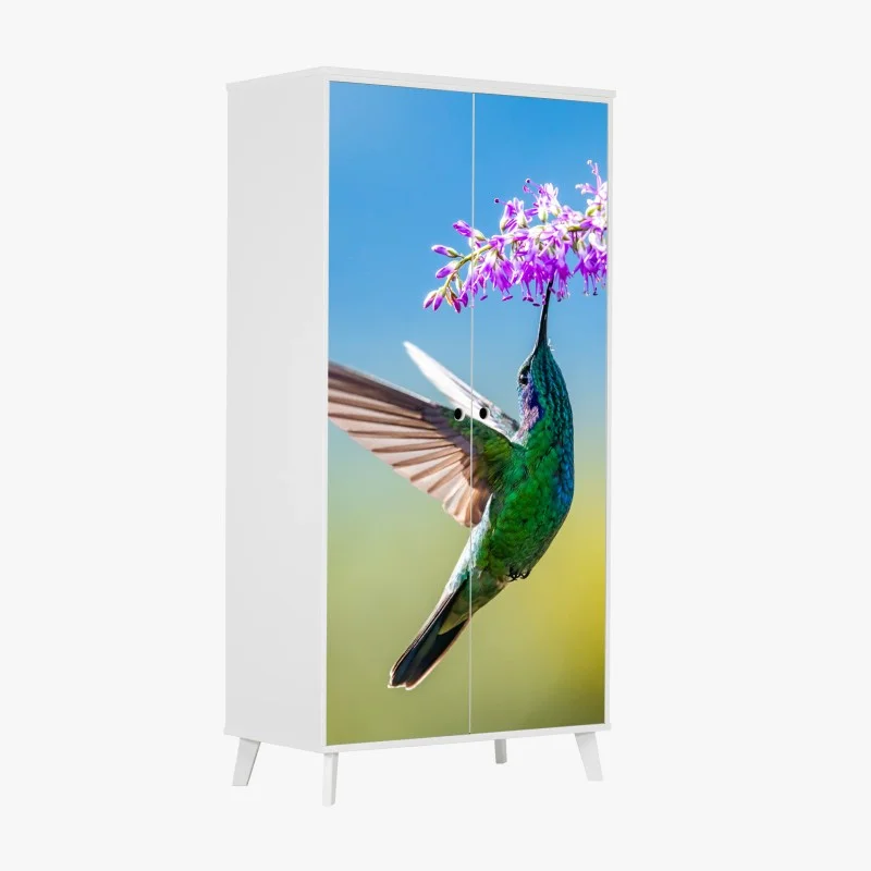 Adesivo per armadio colibrì smeraldo in volo tra fiori viola