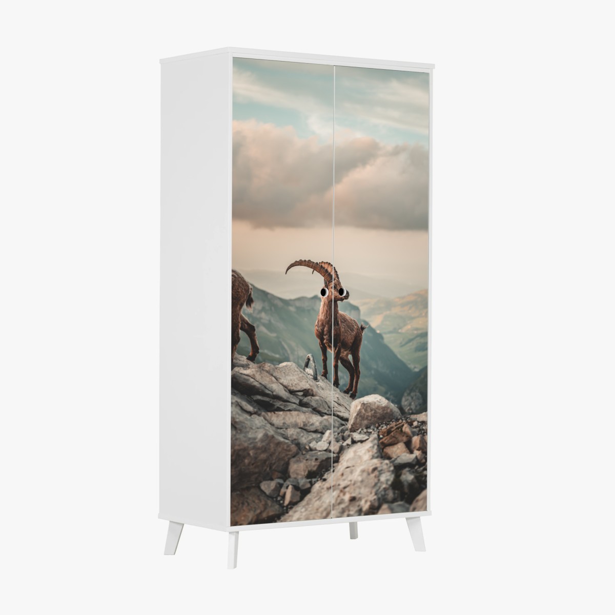 Adesivo per armadio stambecco sulle creste rocciose al tramonto • Wallissimo®