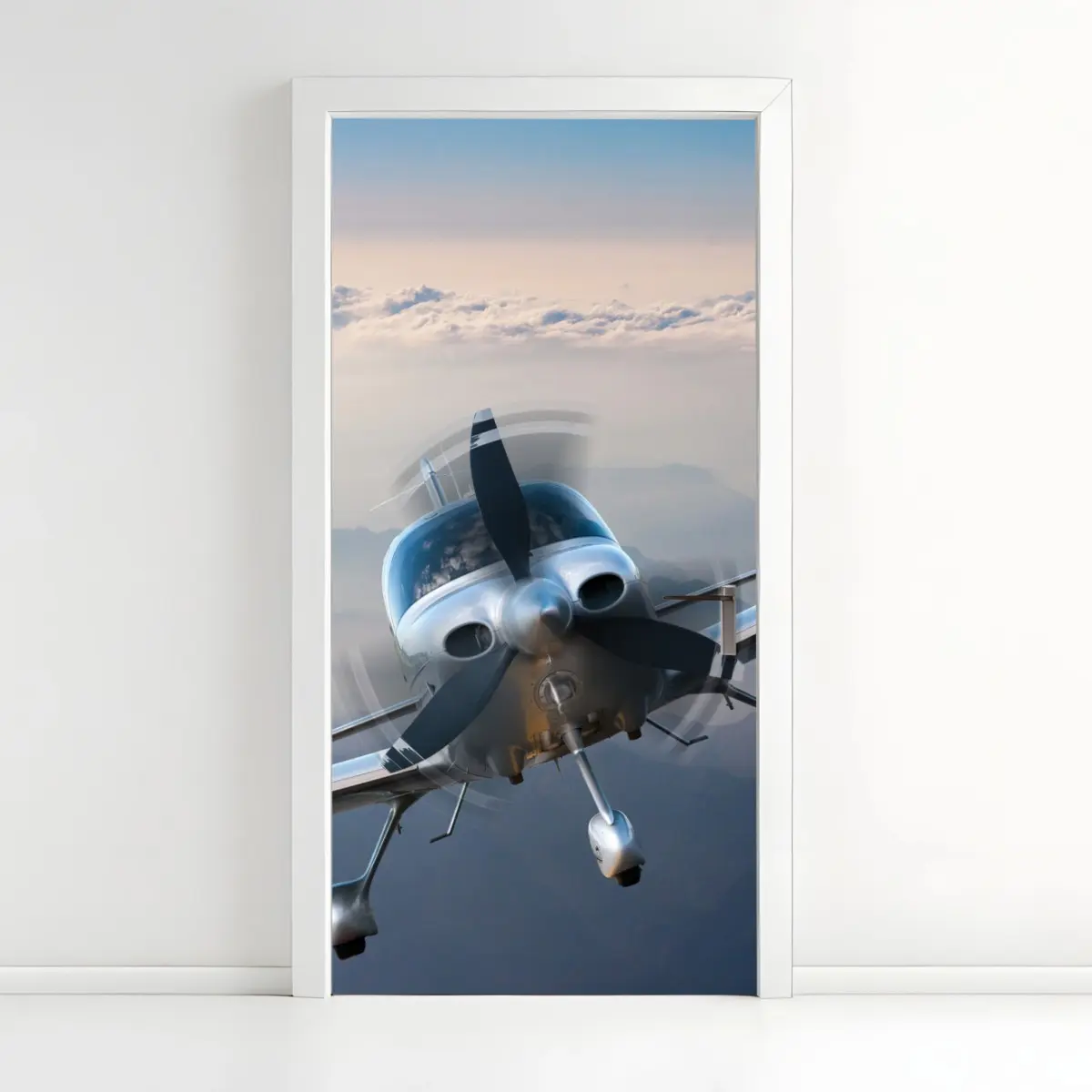 Adesivo per porta aeroplano elegante in volo sopra le montagne • Wallissimo®