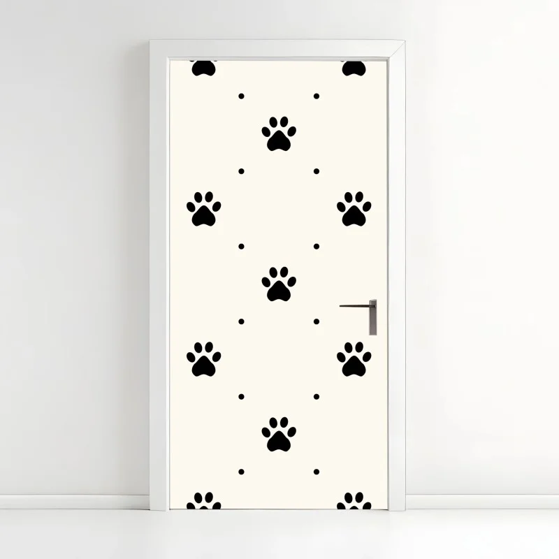 Adesivo per porta motivo di zampe minimal in bianco e nero
