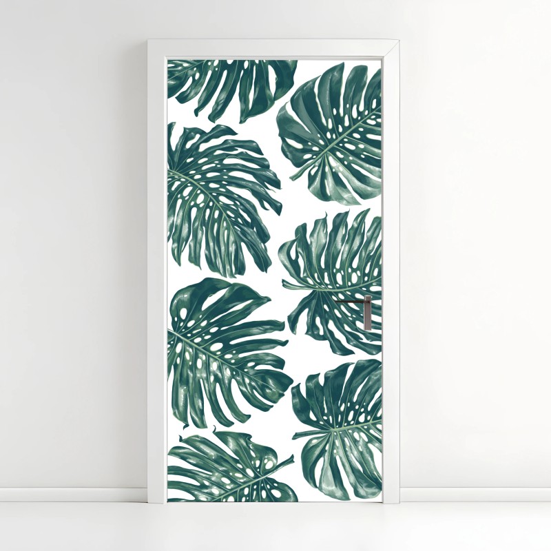 Adesivo per porta design botanico con foglie di monstera su sfondo bianco
