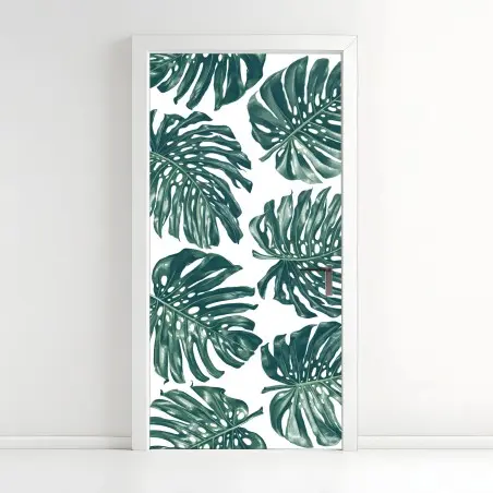 Adesivo per porta design botanico con foglie di monstera su sfondo bianco • Wallissimo®