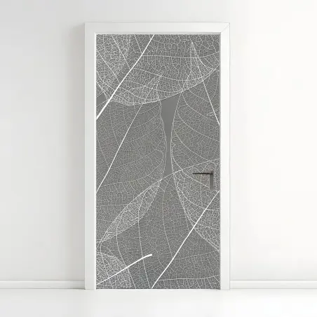 Adesivo per porta motivo di foglie scheletrate su sfondo grigio • Wallissimo®