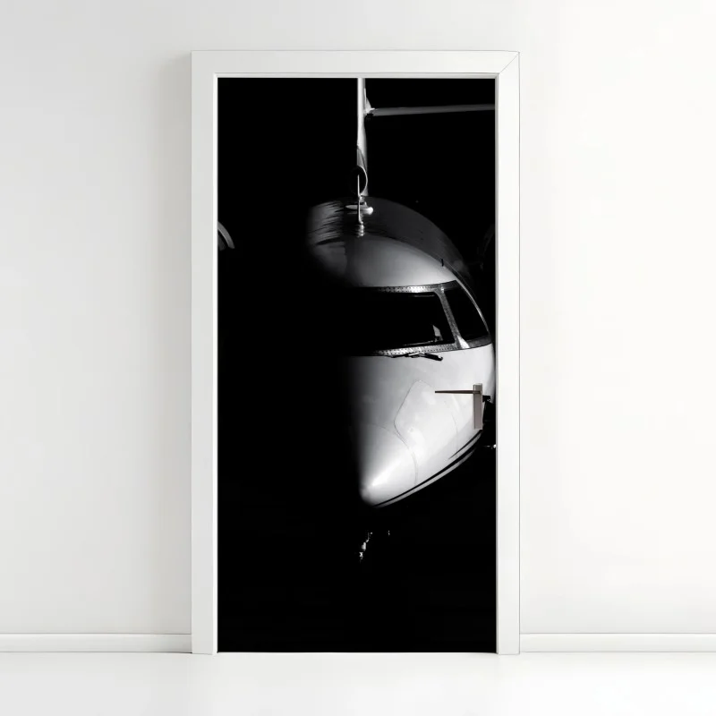 Adesivo per porta profilo frontale di un aereo in bianco e nero