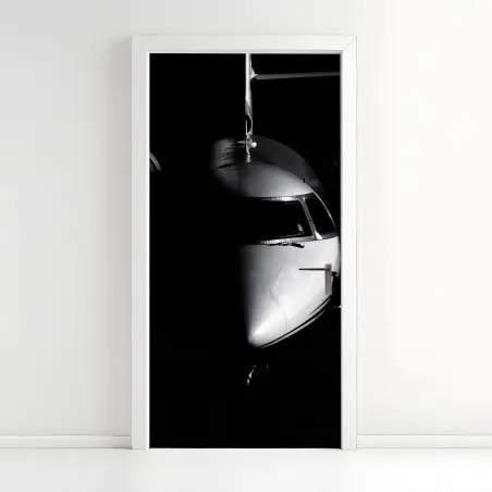 Adesivo per porta profilo frontale di un aereo in bianco e nero • Wallissimo®