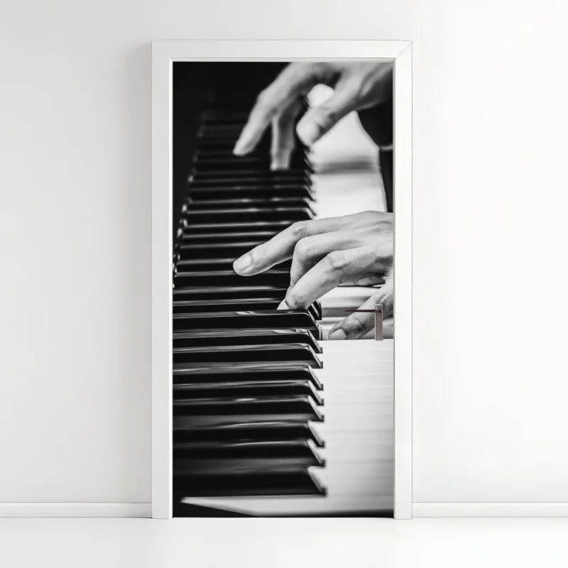 Adesivo per porta mani sul pianoforte in bianco e nero