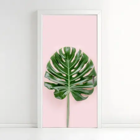 Adesivo per porta foglia di monstera su sfondo rosa pastello • Wallissimo®