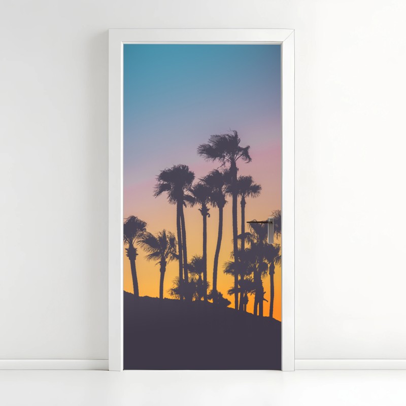 Adesivo per porta tramonto tropicale in silhouette