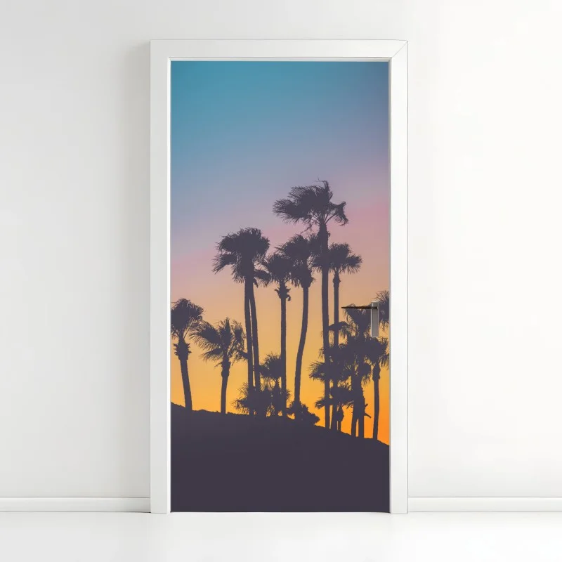Adesivo per porta tramonto tropicale in silhouette