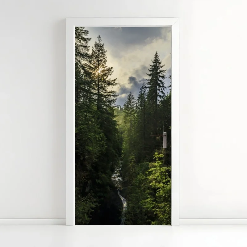 Adesivo per porta luce dorata nella gola della foresta