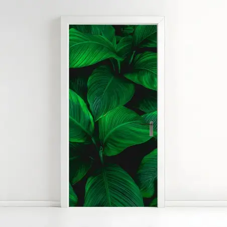 Adesivo per porta oasi verde: foglie tropicali in primo piano • Wallissimo®
