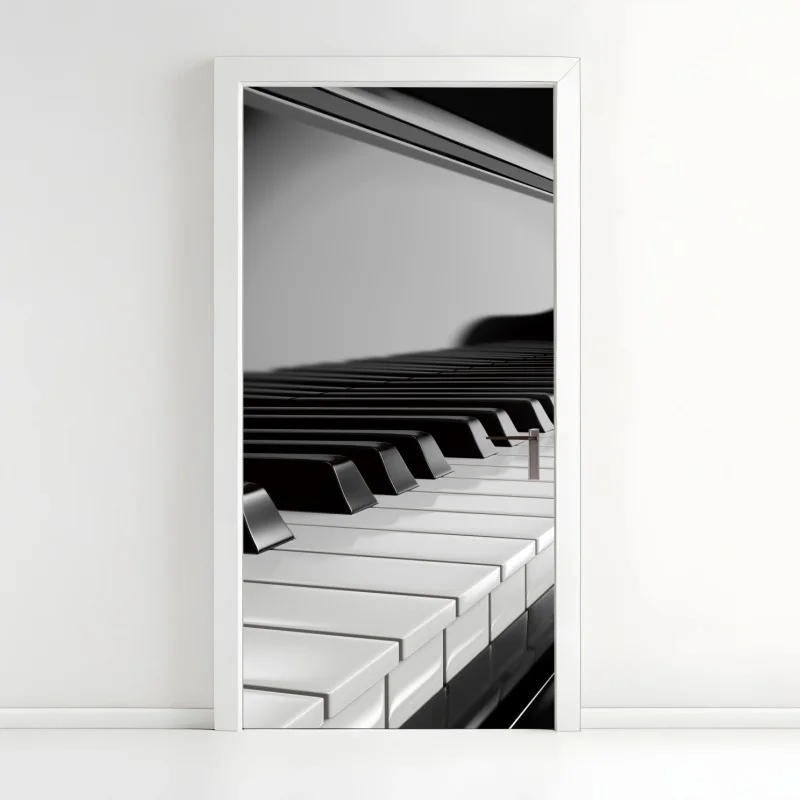 Adesivo per porta eleganza in bianco e nero: tastiera di pianoforte