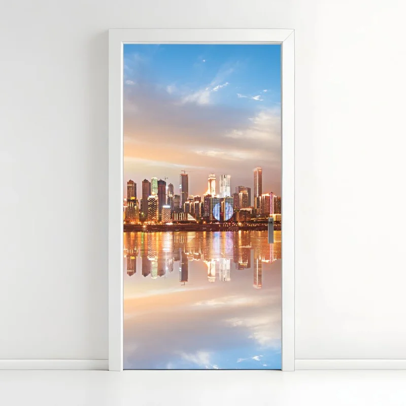 Adesivo per porta panorama urbano al tramonto riflesso sull'acqua