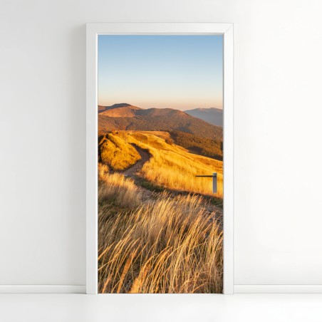 Adesivo per porta panorama montano al tramonto dorato • Wallissimo®