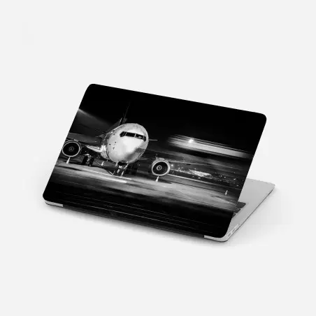 Adesivo per laptop aereo in primo piano sulla pista di notte • Wallissimo®