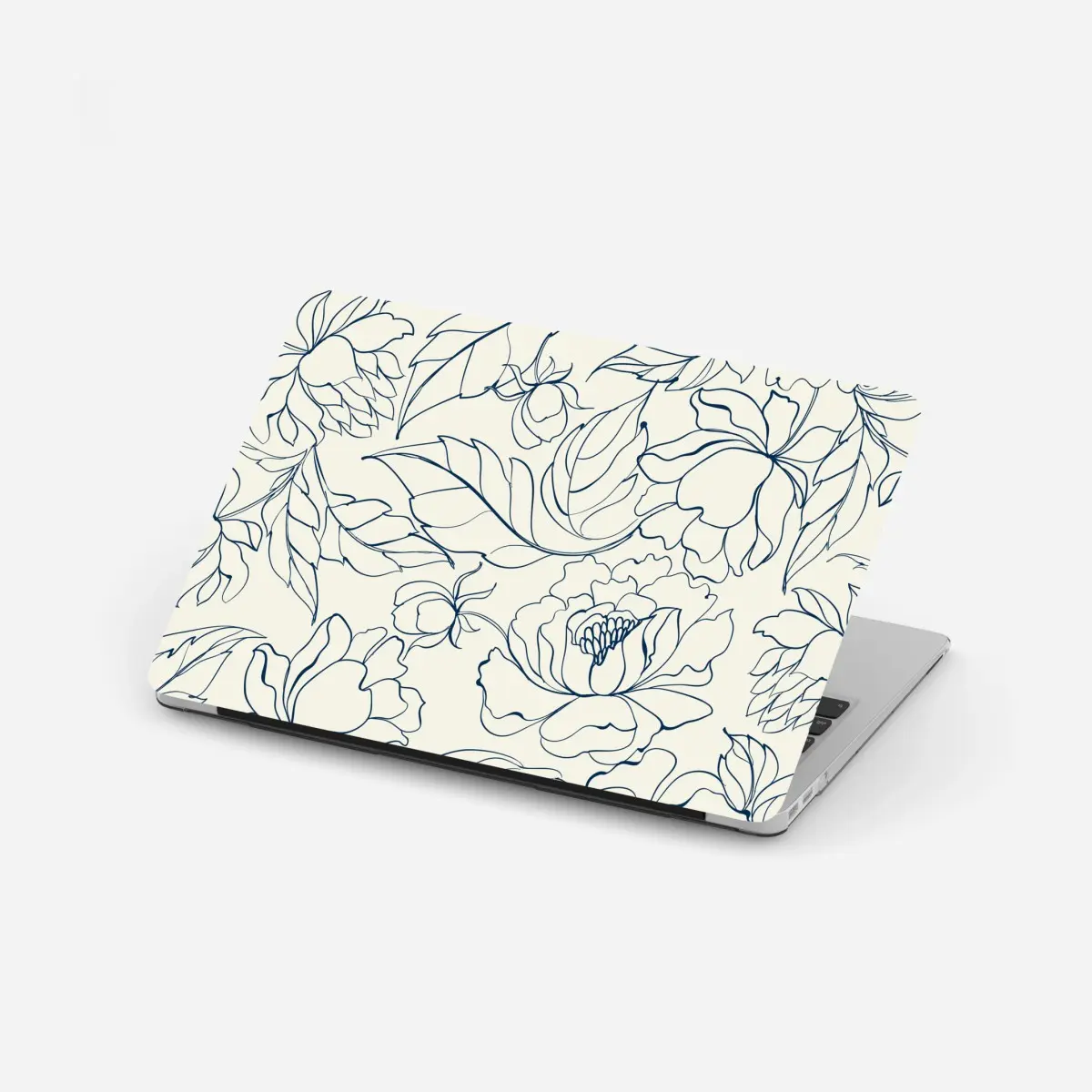 Adesivo per laptop elegante motivo floreale blu su fondo crema • Wallissimo®
