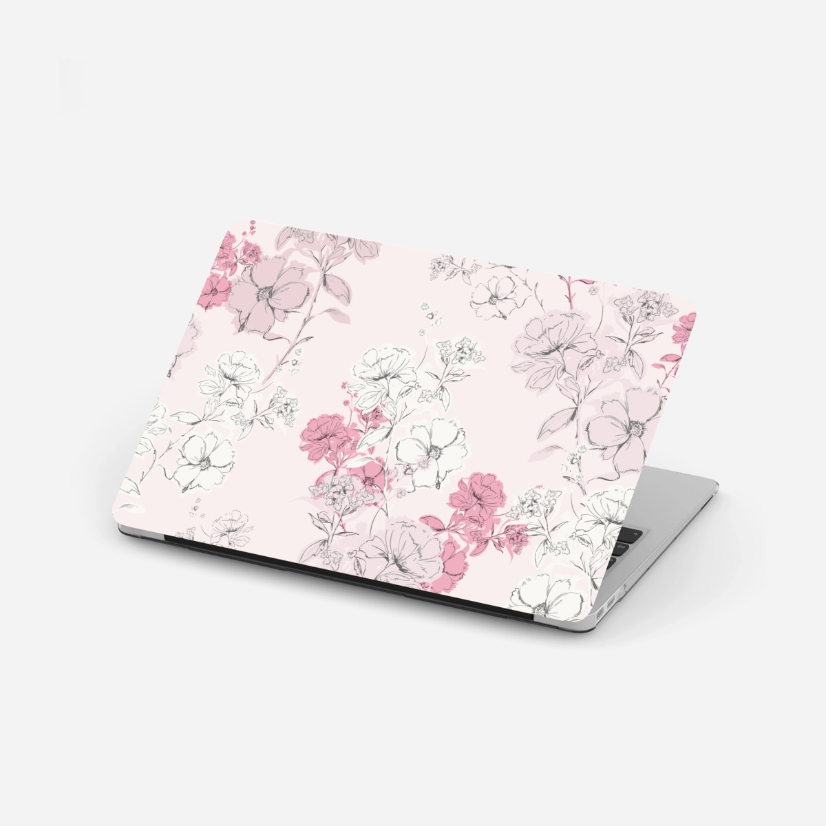 Adesivo per laptop fiori romantici su sfondo rosa • Wallissimo®